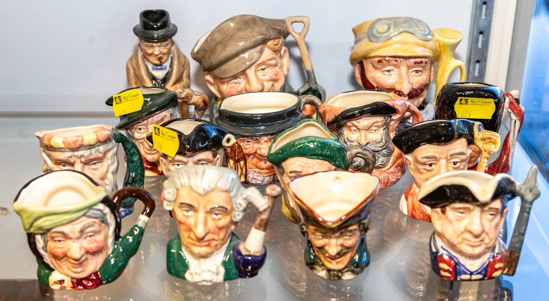 An Assortment of Royal Doulton Character Jugs