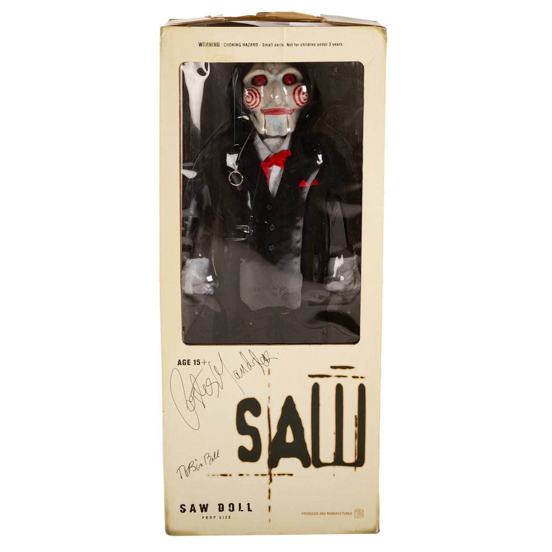 A "Prop Size" Saw Doll with Actor Signitures