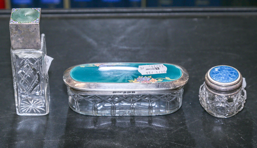 Three Guilloche Enamel on Silver Dresser Articles