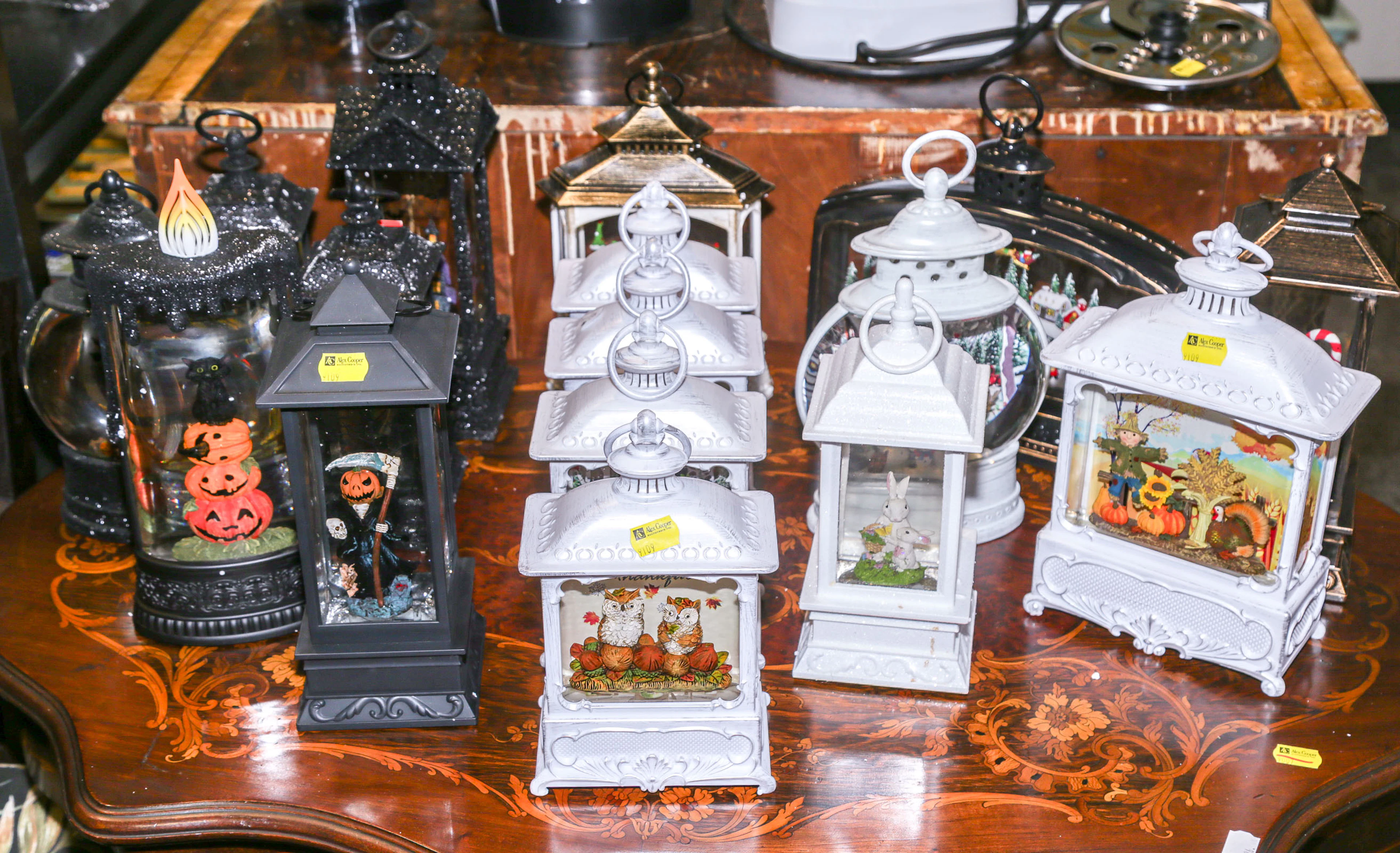 A Group of 15 Decorative Holiday Confetti Lanterns