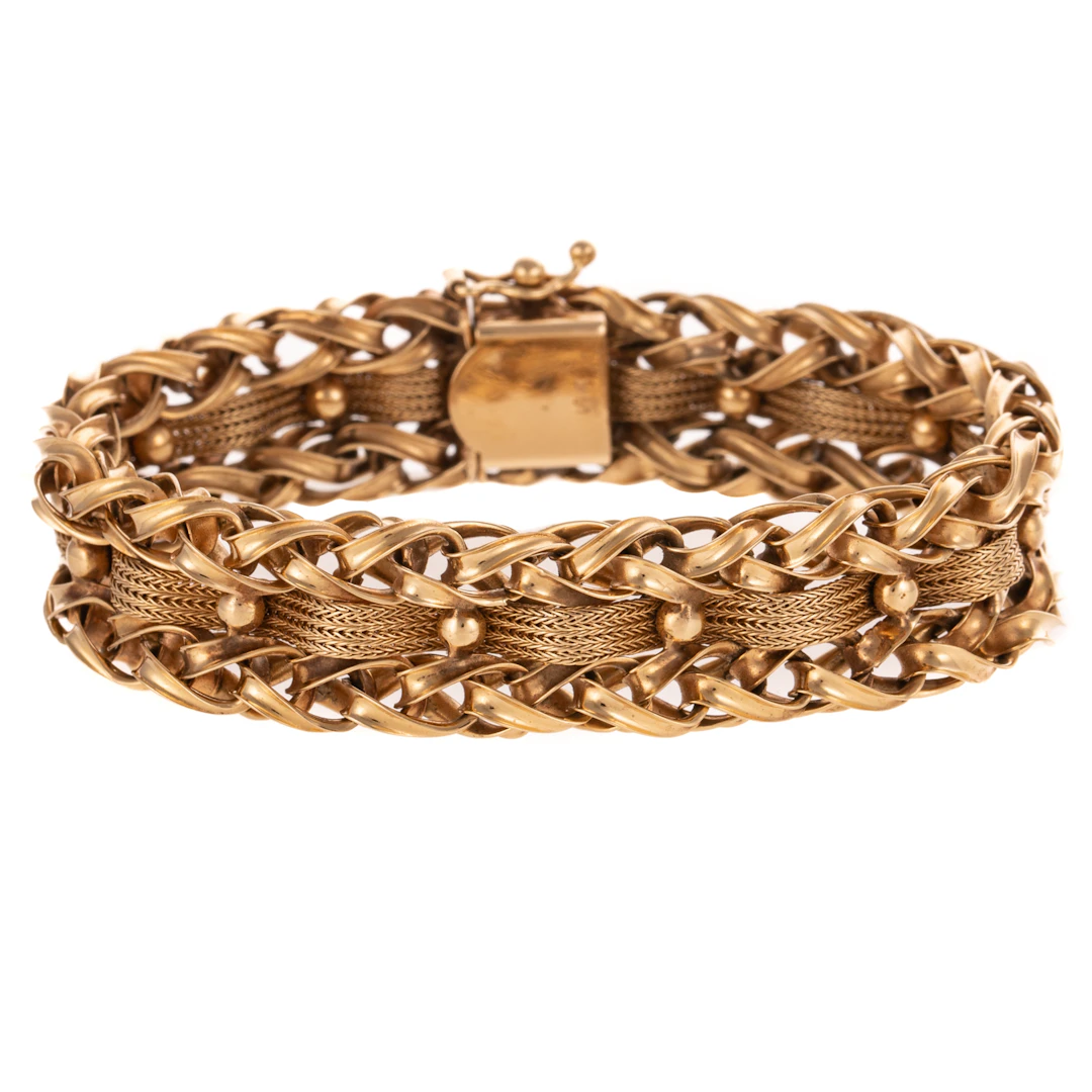 A Wide Woven Gold Bracelet in 14K