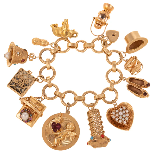 A Whimsical Charm Bracelet with 13 Gold Charms in 14K & 18K