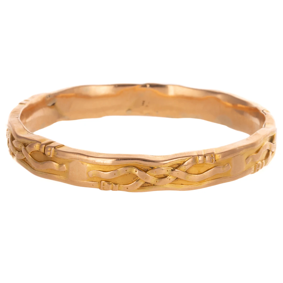 An Art Nouveau Riker Brothers Bangle in 14K