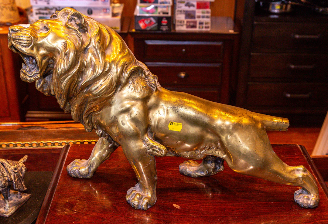 A Continental Gilt Bronze Lion