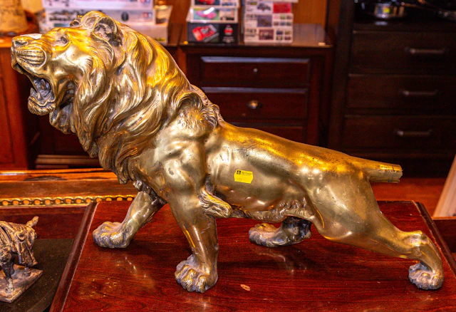 A Continental Gilt Bronze Lion