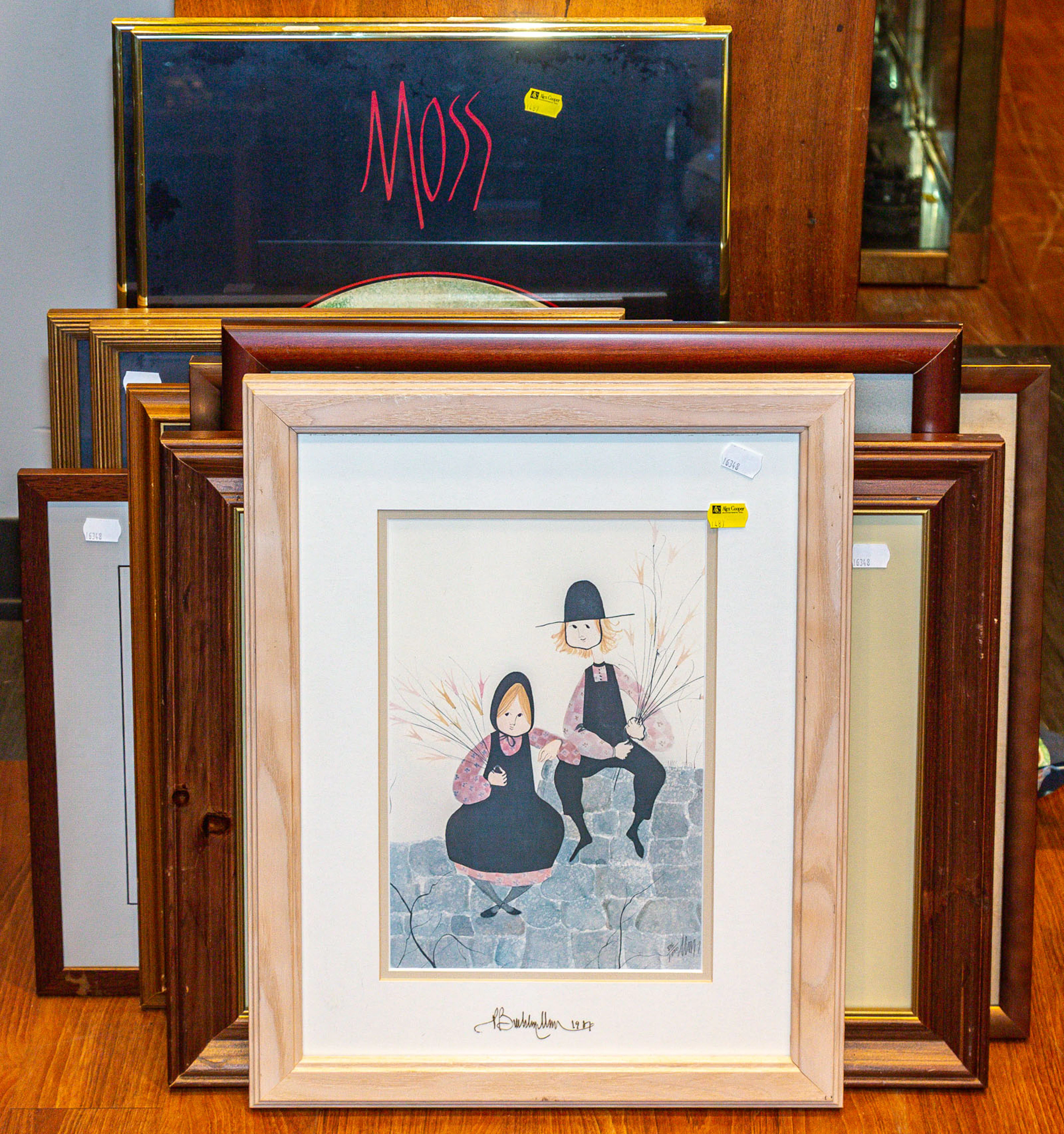 An Assortment of Framed Artworks