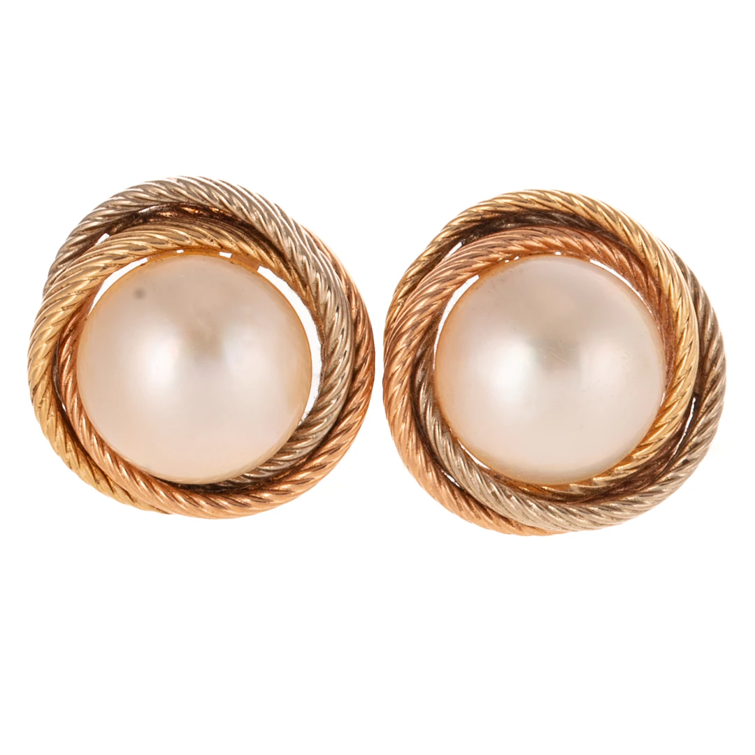 A Pair of Mabe Pearl Ear Clips in 14K