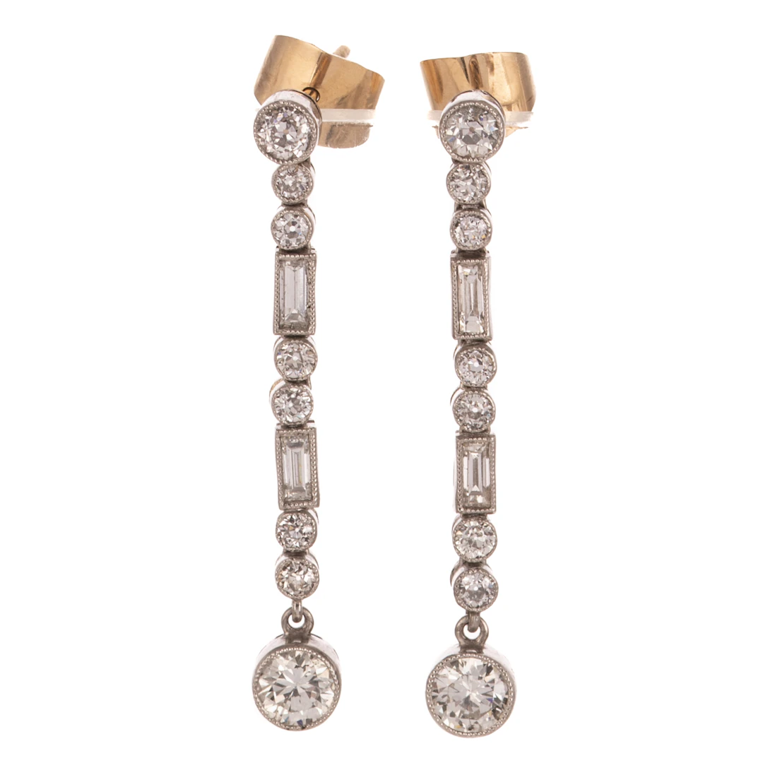 An Art Deco Diamond Linear Dangle Earrings in Platinum