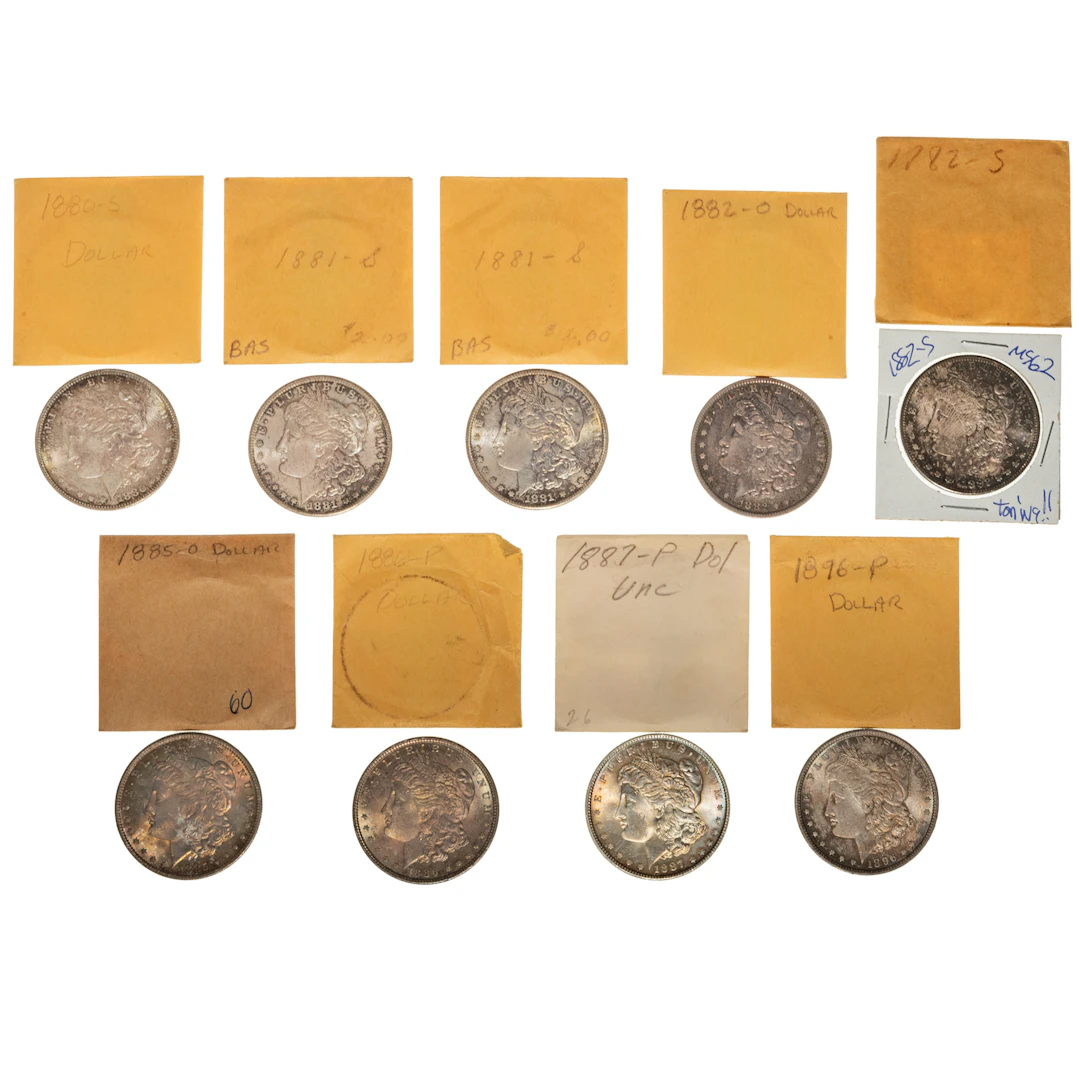 A Group of Nine Envelope Toned Morgan Dollars
