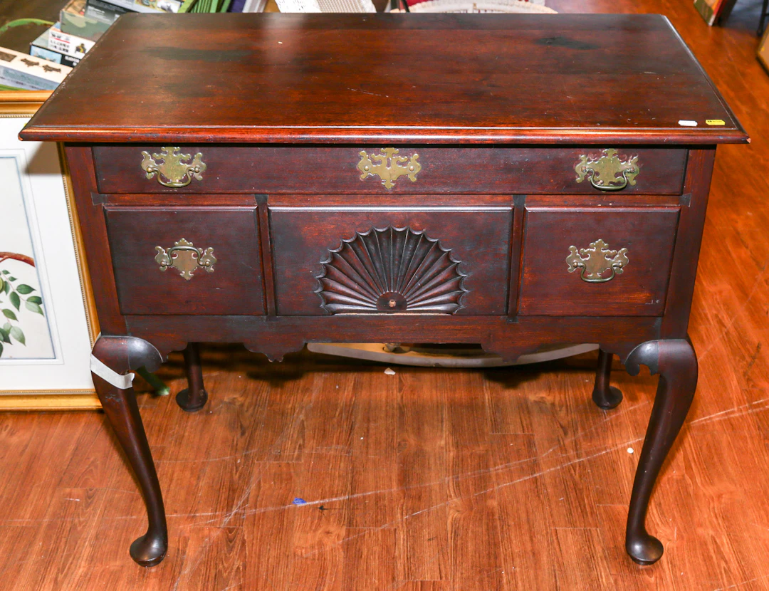 A Centennial Queen Anne Style Cherry Lowboy