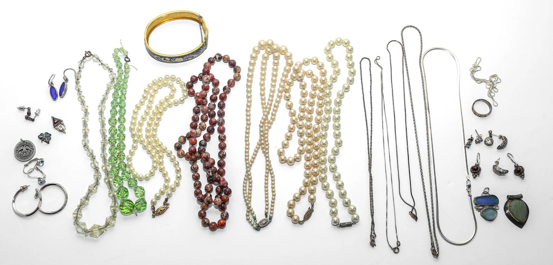 A Collection of Sterling & Costume Jewelry