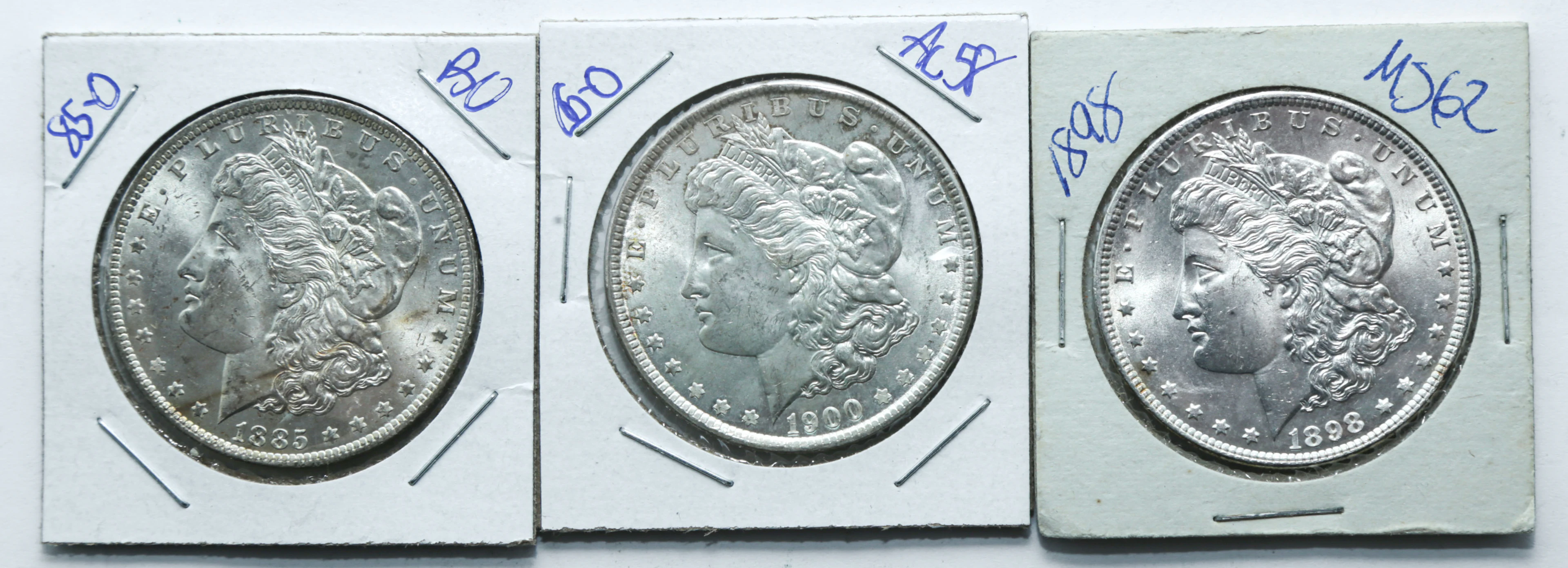 Three AU/Unc Morgan Dollars
