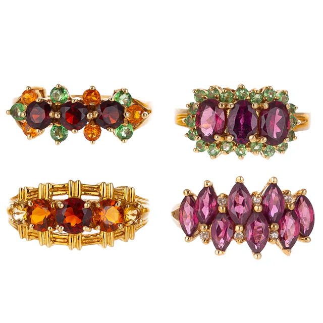 A Group of Four Multi-Gemstone Rings in 14K