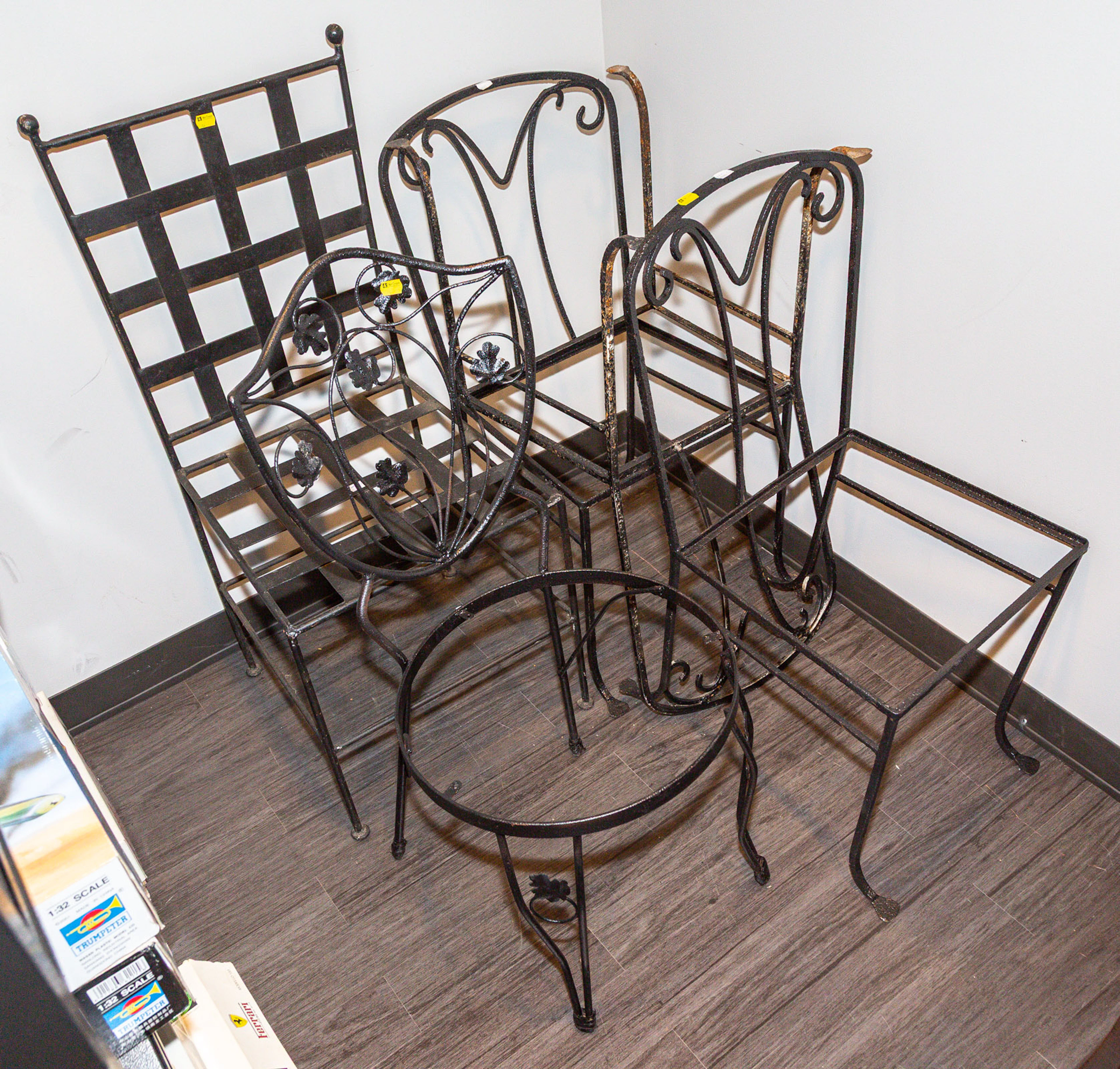 A Group of Iron Patio Chairs