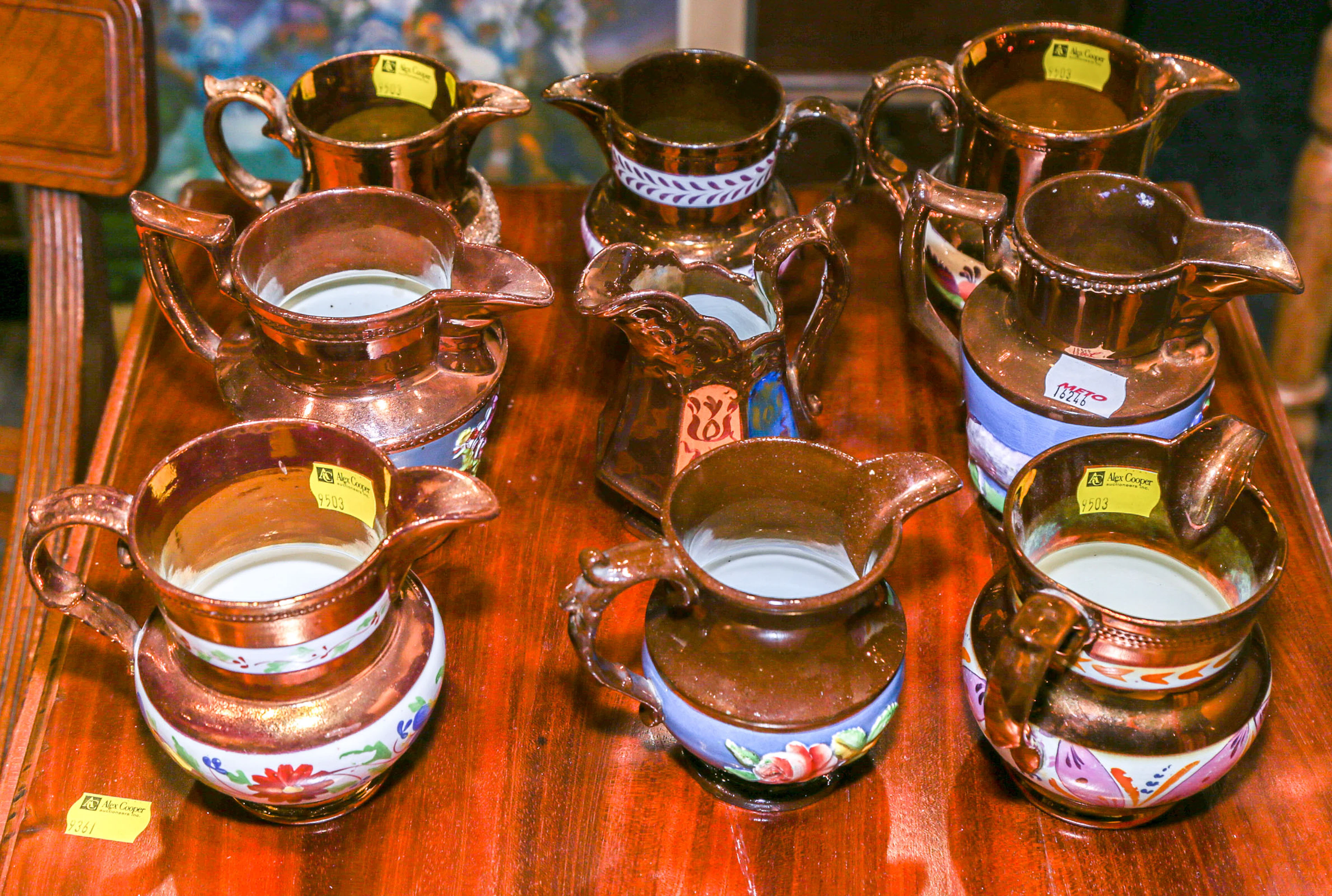 A Selection of 9 Copper Lustre Cream Jugs