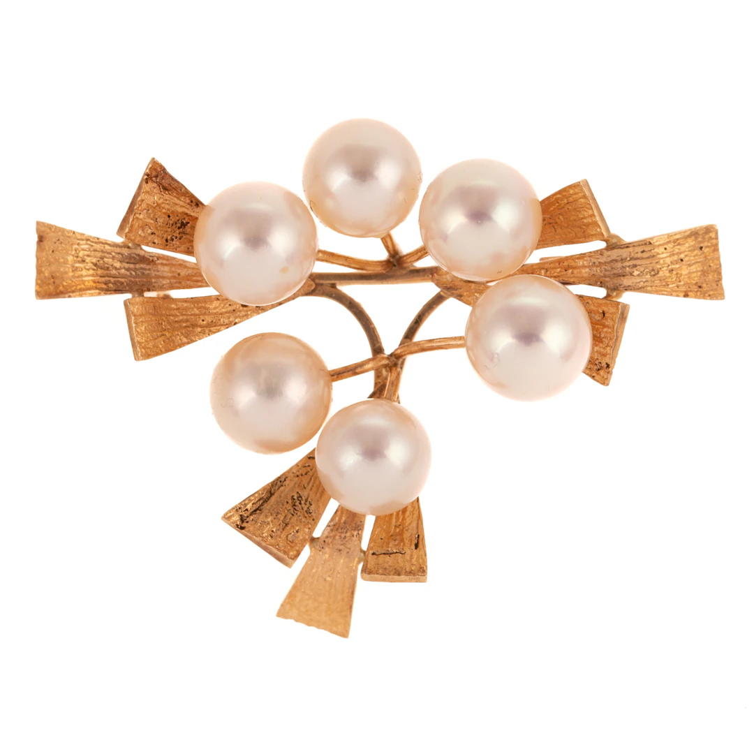 A Fine Pearl Ribbon Brooch in 14K