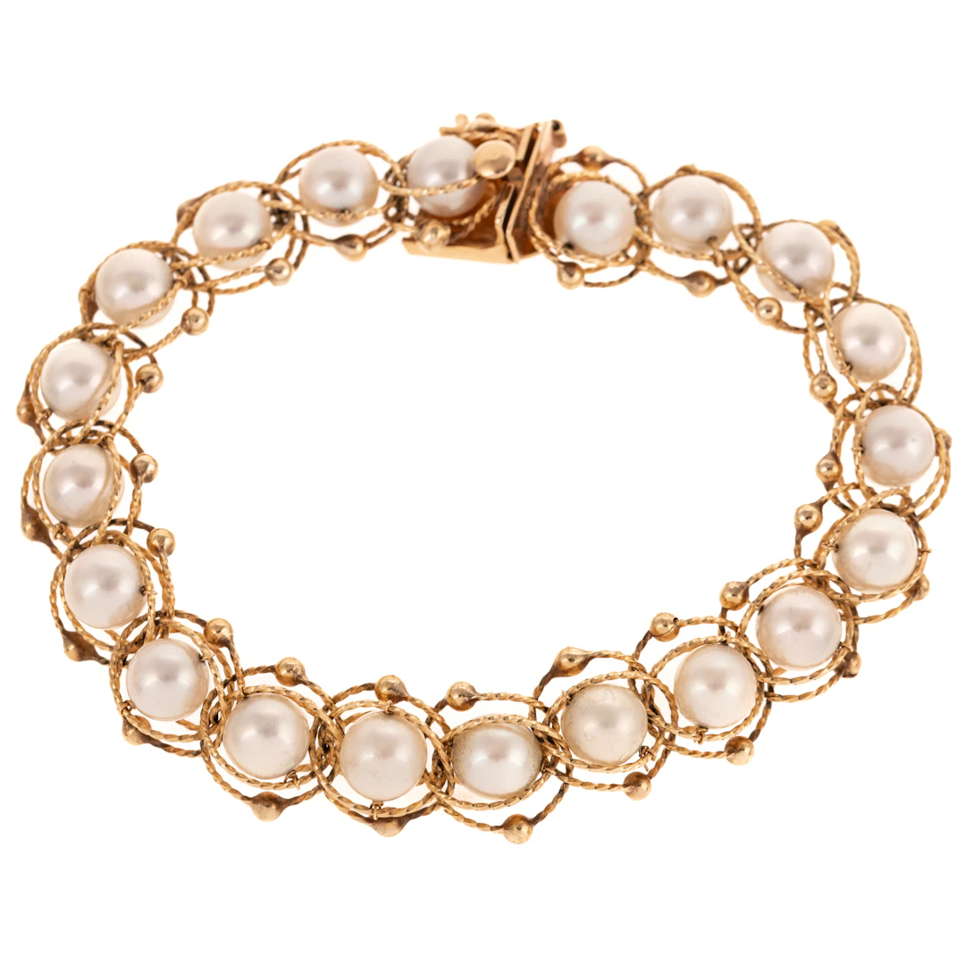 A Twisted Gold Pearl Bracelet in 14K