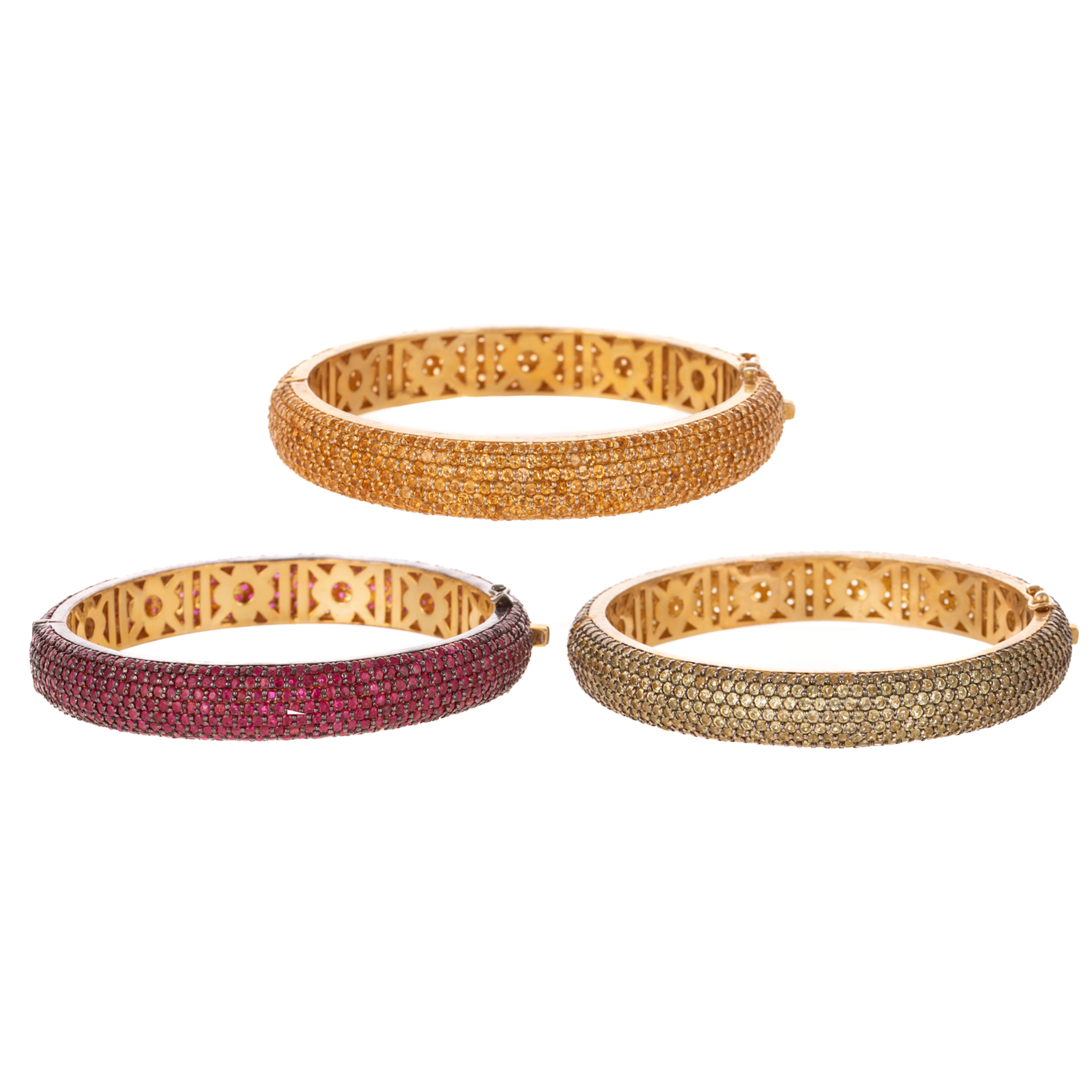 A Trio Pave Set Gemstone Bangles
