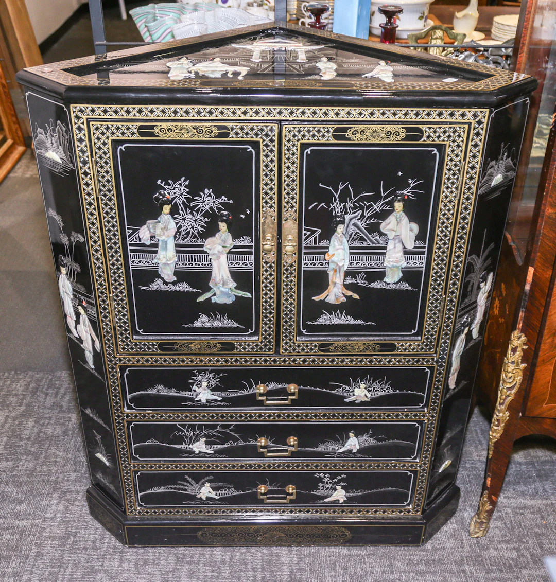 A Chinese Decorated Low Corner Cabinet