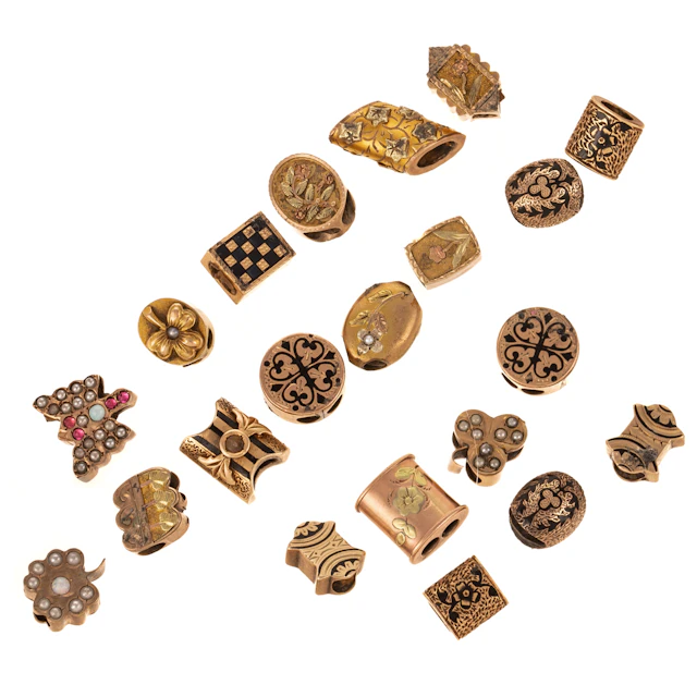 A Collection of Victorian Watch Chain Slides in Gold