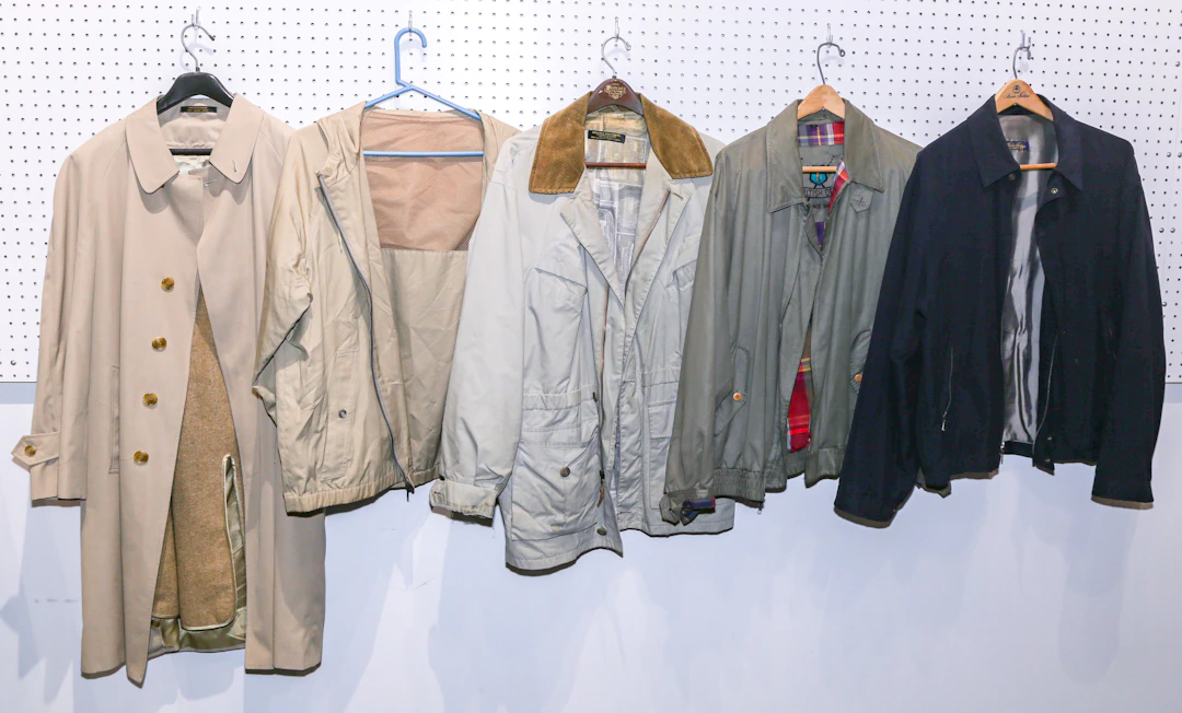 Four Gentlemen's Rain Jackets & a Rain Coat