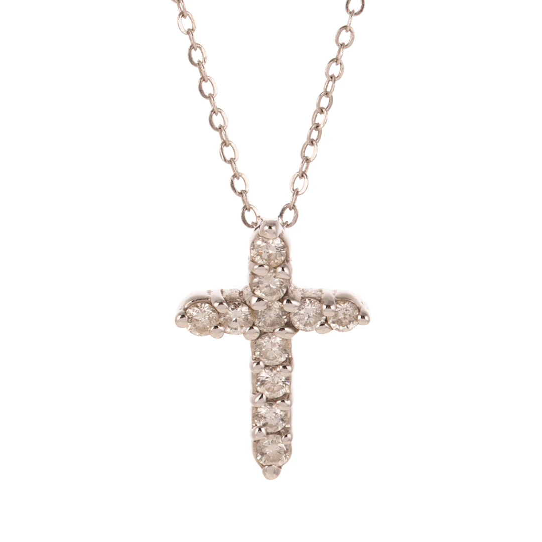 A Diamond Cross Pendant and Chain in 14K