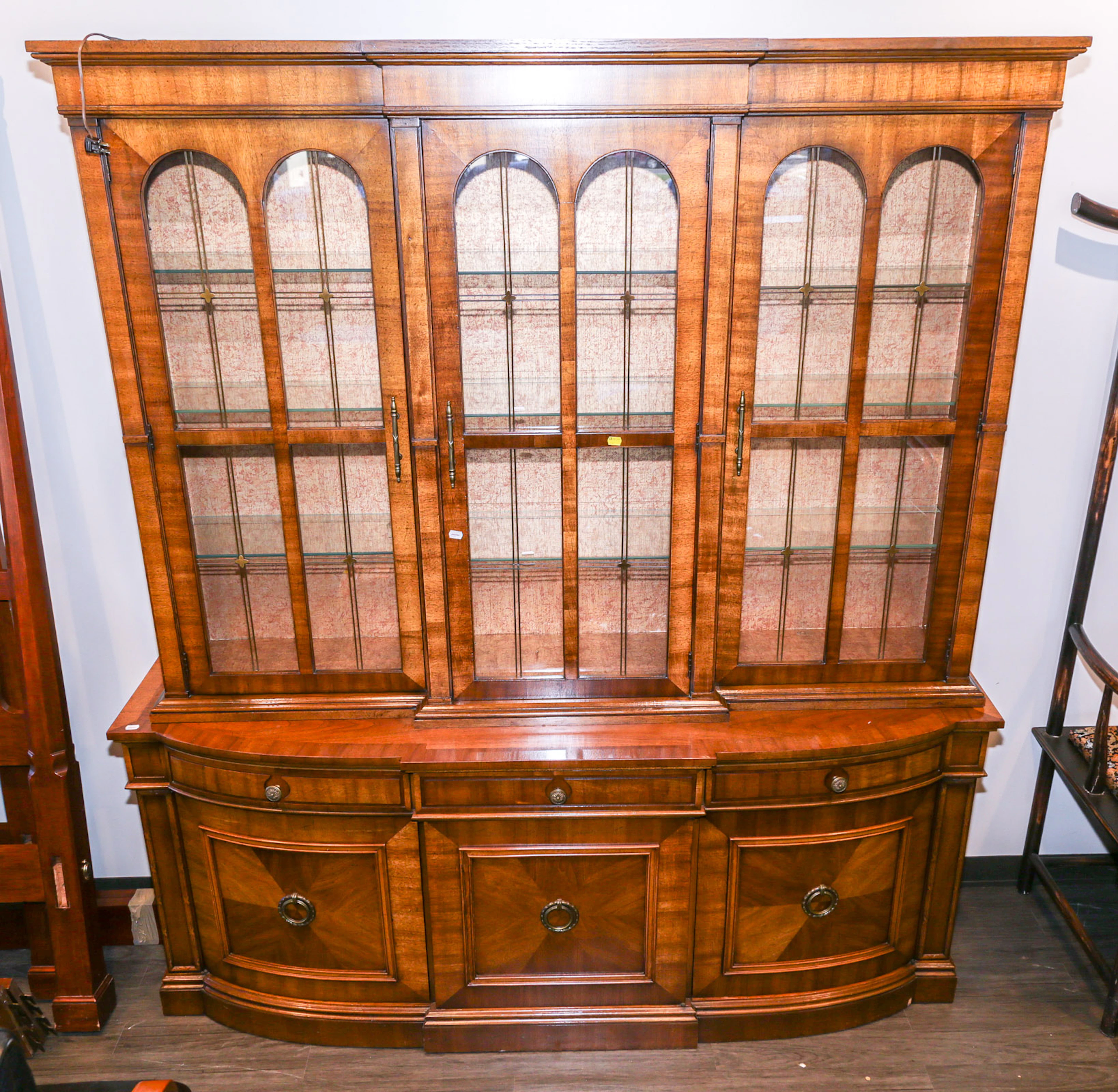 A Mediterranean Style Walnut Breakfront Cabinet