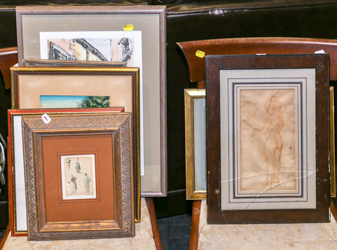 An Assortment of Framed Artworks