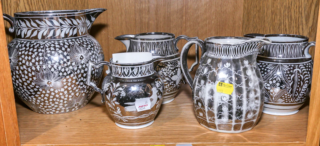 Five English Silver Lustre Jugs