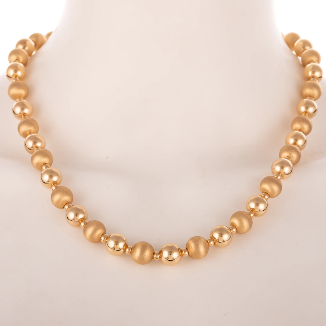 A Classic Textured Beaded Necklace in 14K