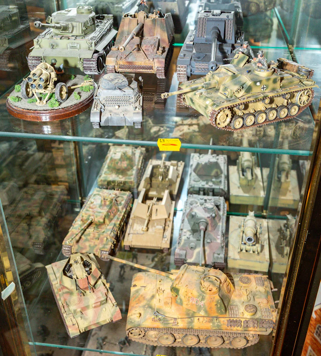 Two Shelves of Assembled & Painted German Models