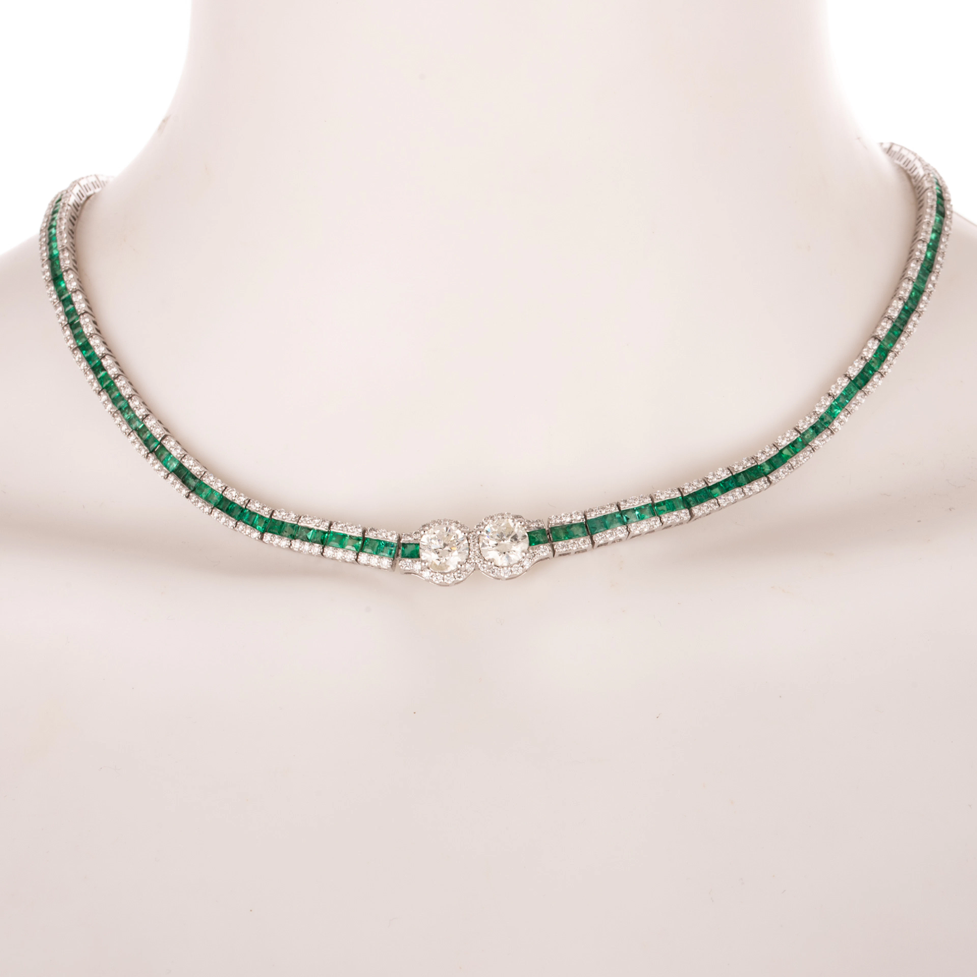 An Important Diamond & Emerald Line Necklace in Platinum