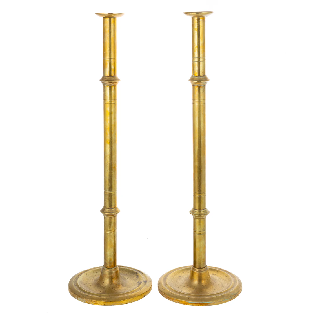 A Pair of English Brass Push-Up Candlesticks