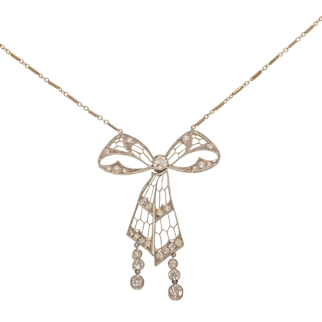 An Edwardian Diamond Bow Necklace in Platinum
