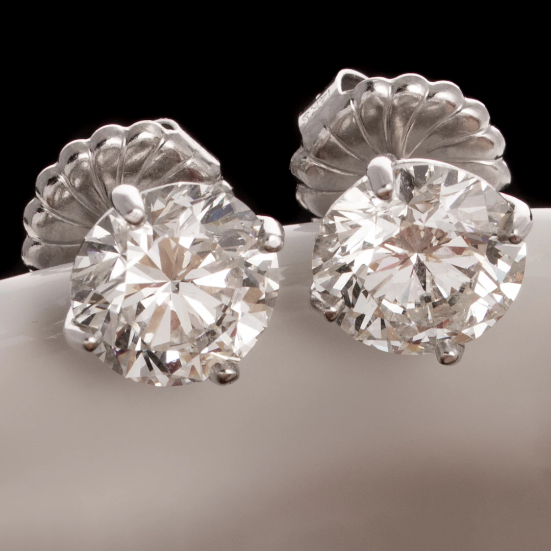 A Pair of 6.02 Diamond Studs: EGL Certified