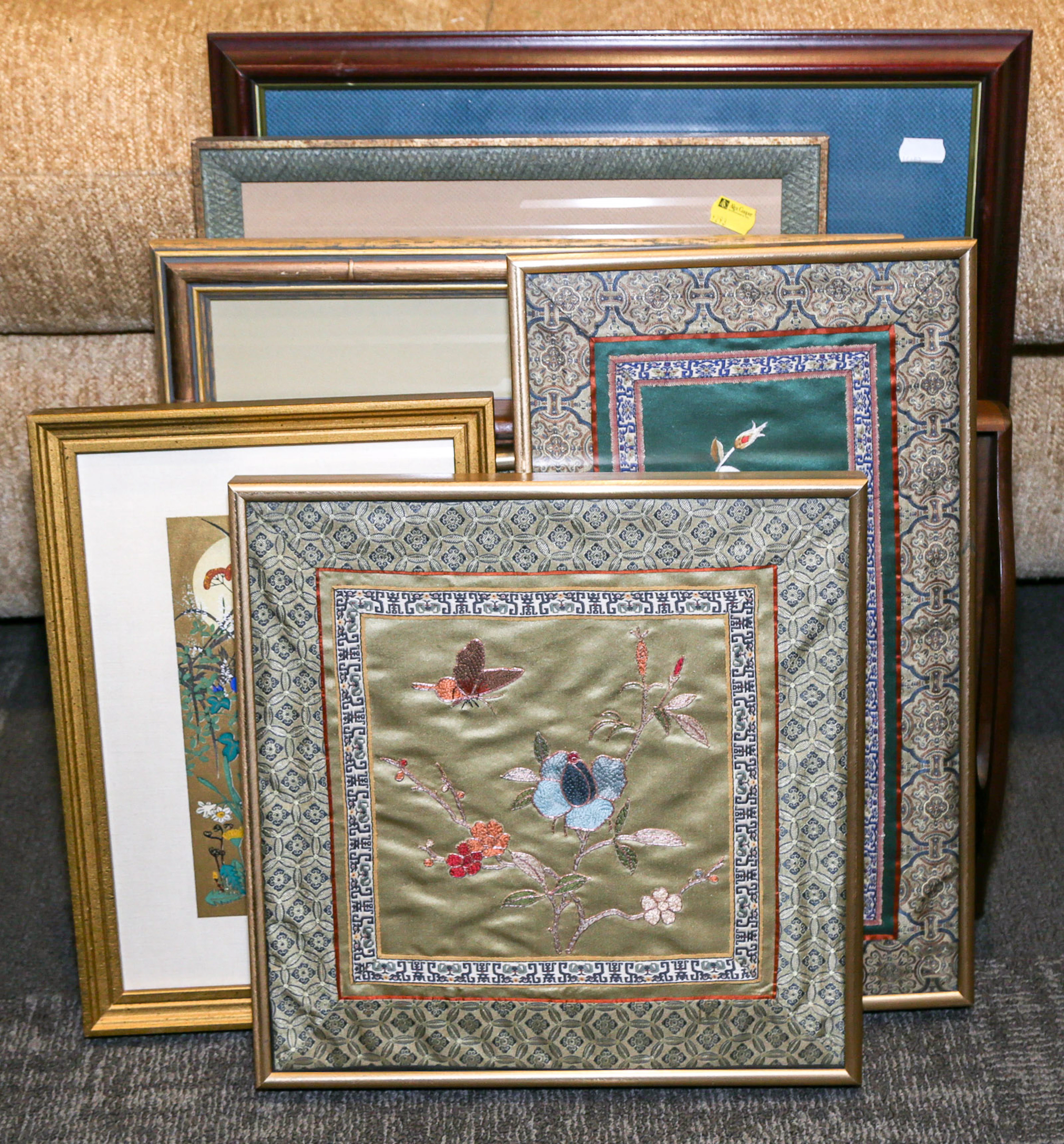 An Assortment of Eight Framed Items