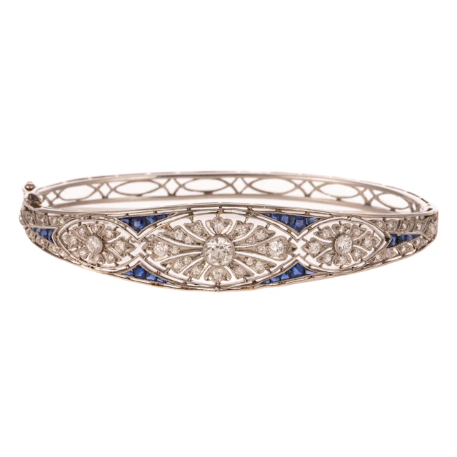 An Art Deco Diamond & Sapphire Bangle Bracelet in Platinum