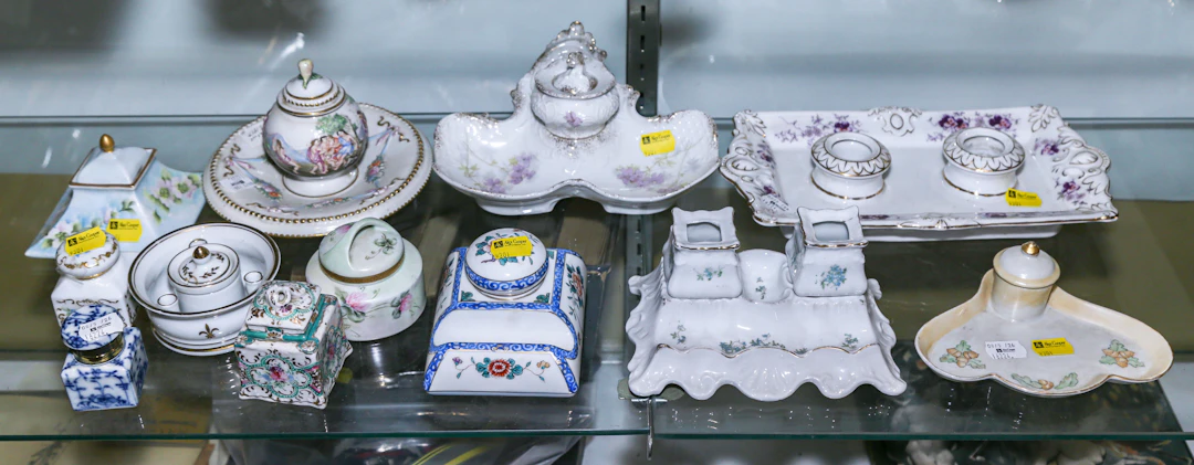 A Group of Continental Porcelain Inkwells