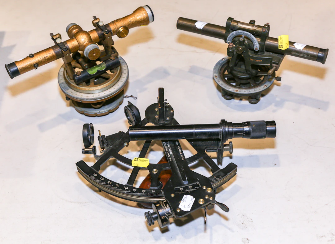 A U.S. Navy Sextant & Two Surveyor's Transits