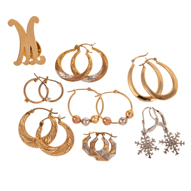 A Group of Mostly Hoop Earrings in Gold