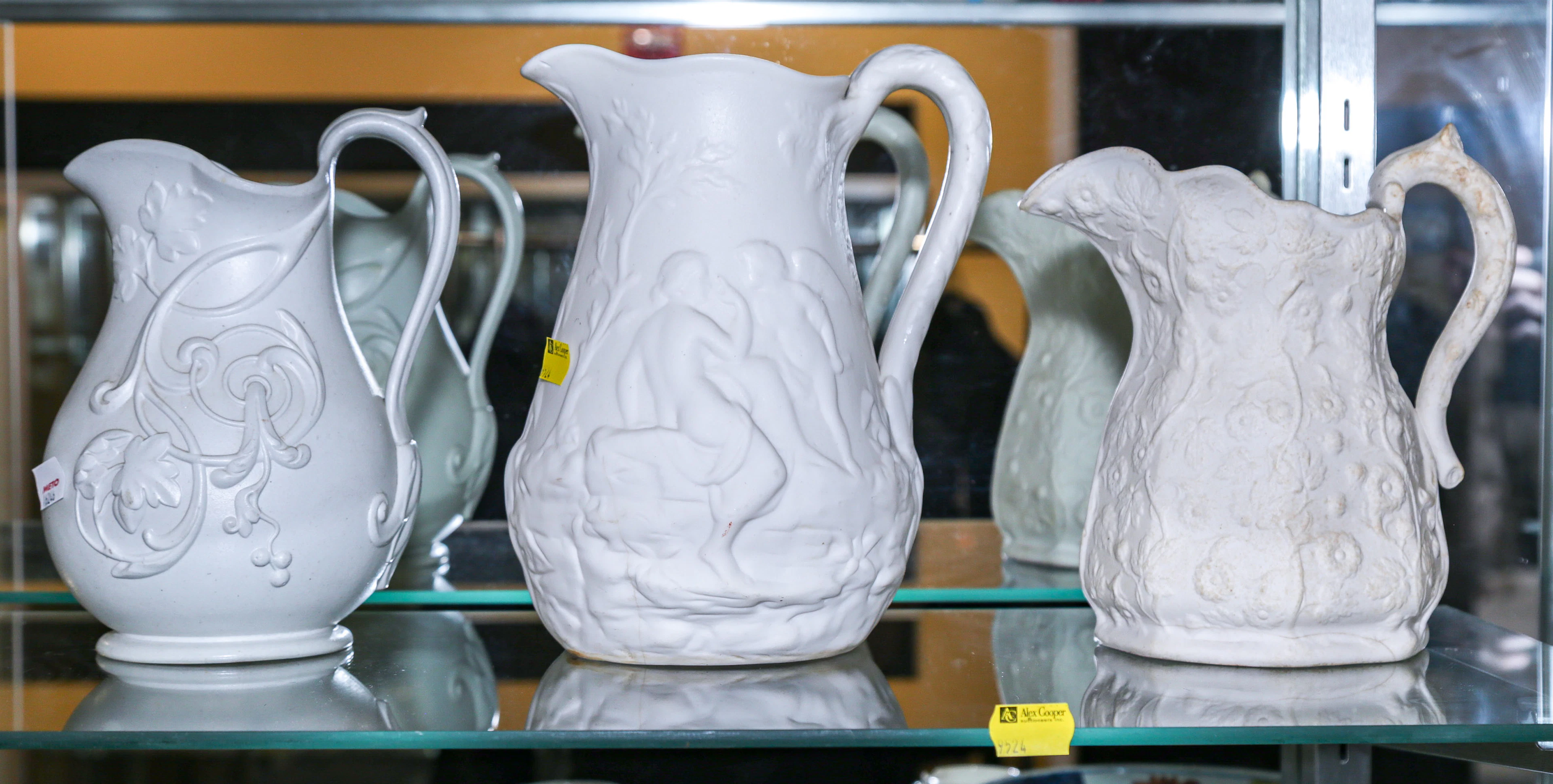 Three Victorian Parian Ware Pitchers