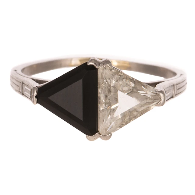 An Art Deco Diamond & Black Onyx Toi et Moi Ring in Platinum