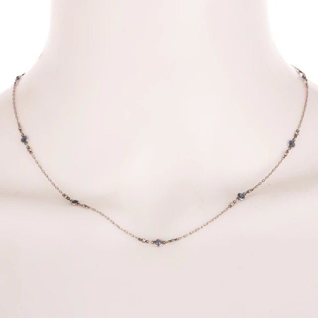 An Art Deco Sapphire & Diamond Station Necklace in Platinum