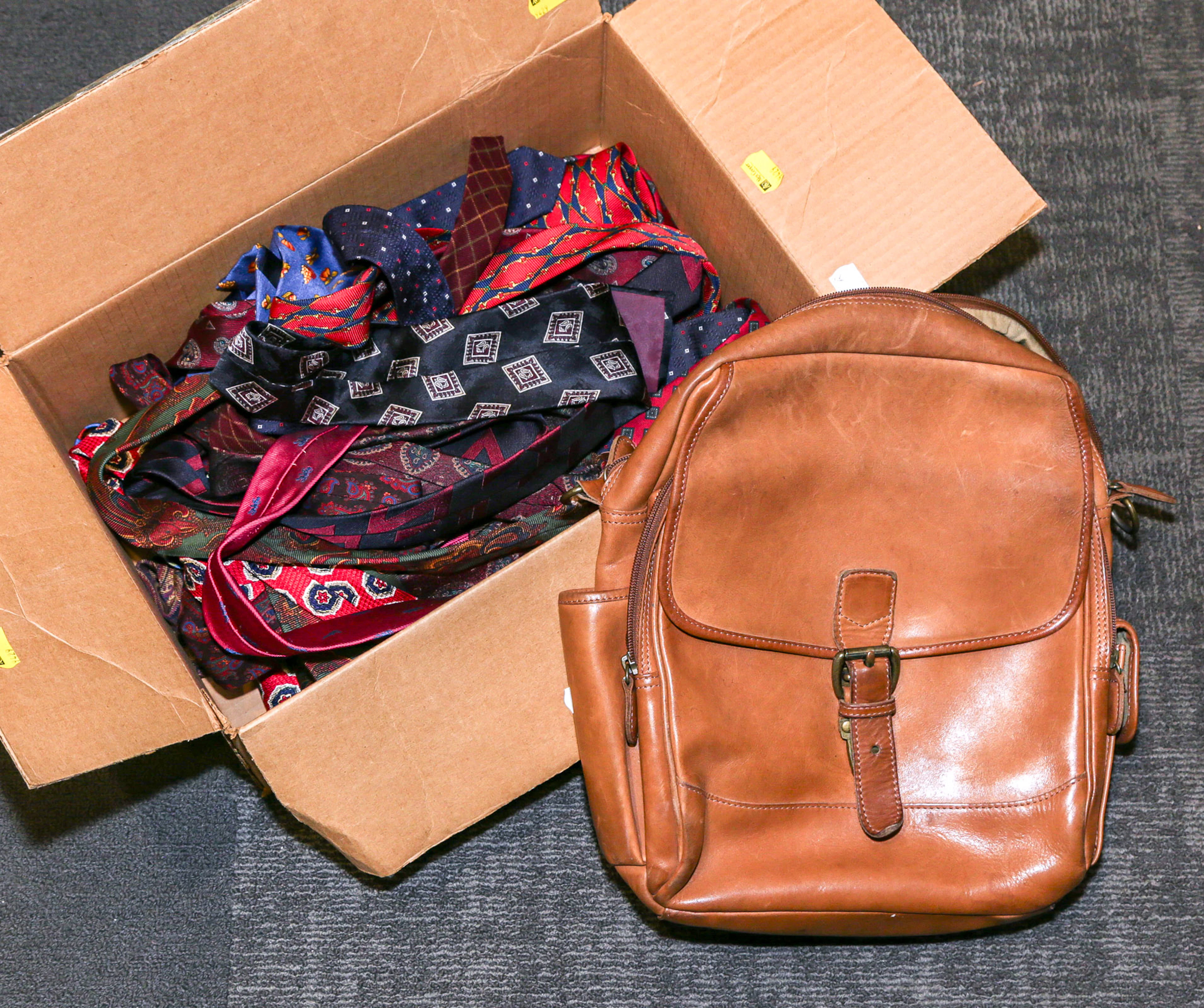 An L.L. Bean Courier Bag & Gentlemen's Neckties