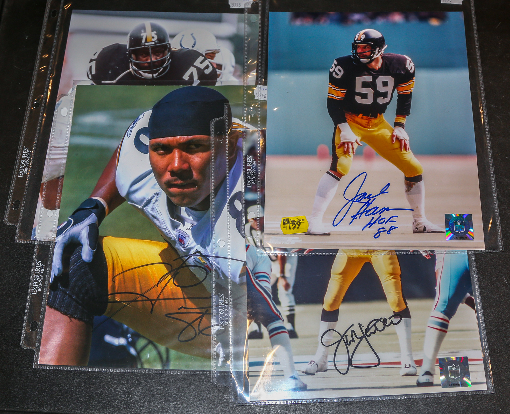 Four Signed Pittsburgh Steelers Photographs