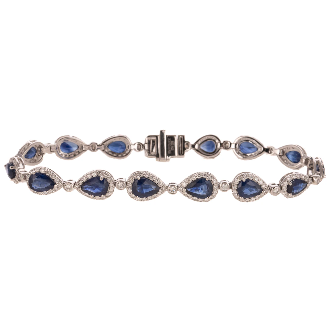 A Sapphire & Diamond Halo Line Bracelet in Platinum