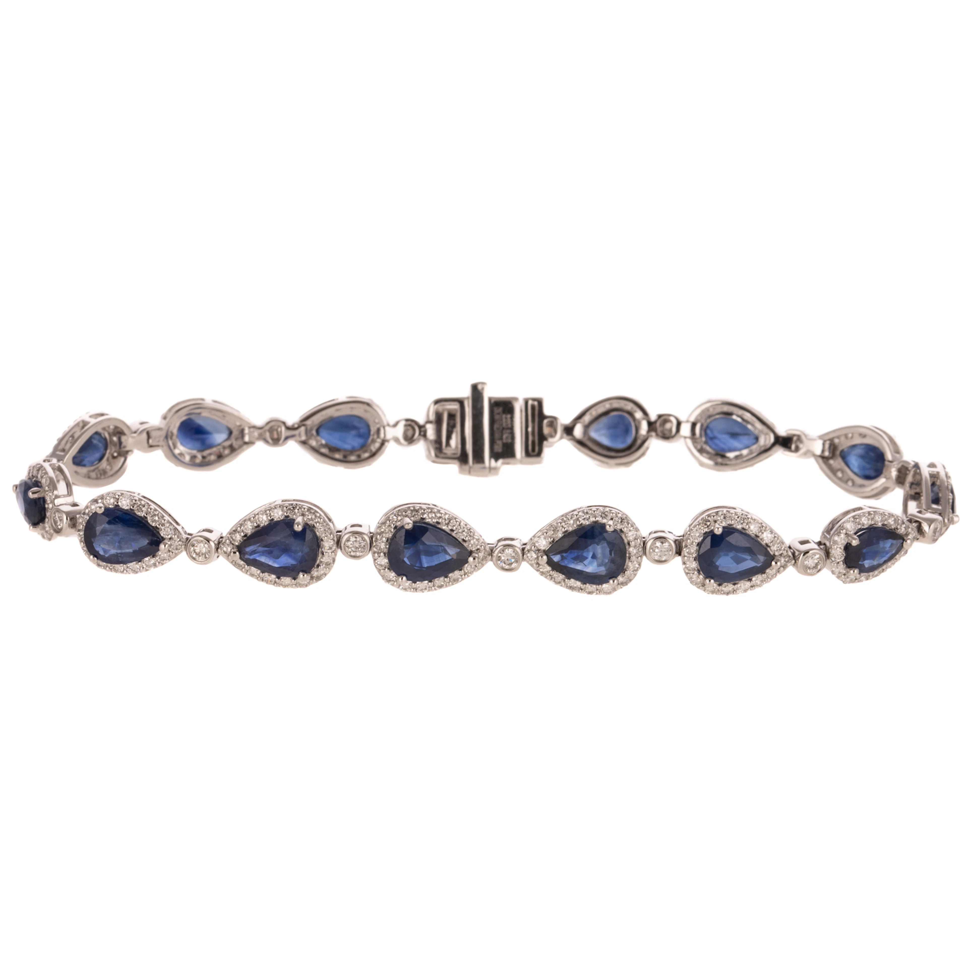 A Sapphire & Diamond Halo Line Bracelet in Platinum