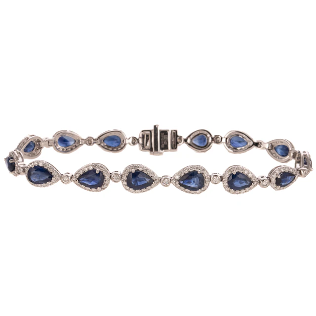 A Sapphire & Diamond Halo Line Bracelet in Platinum