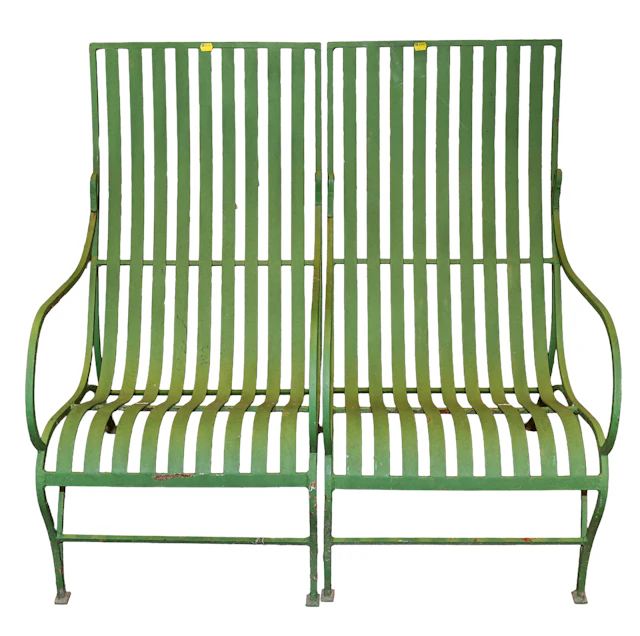 A Pair of Wrought Iron Patio Chairs