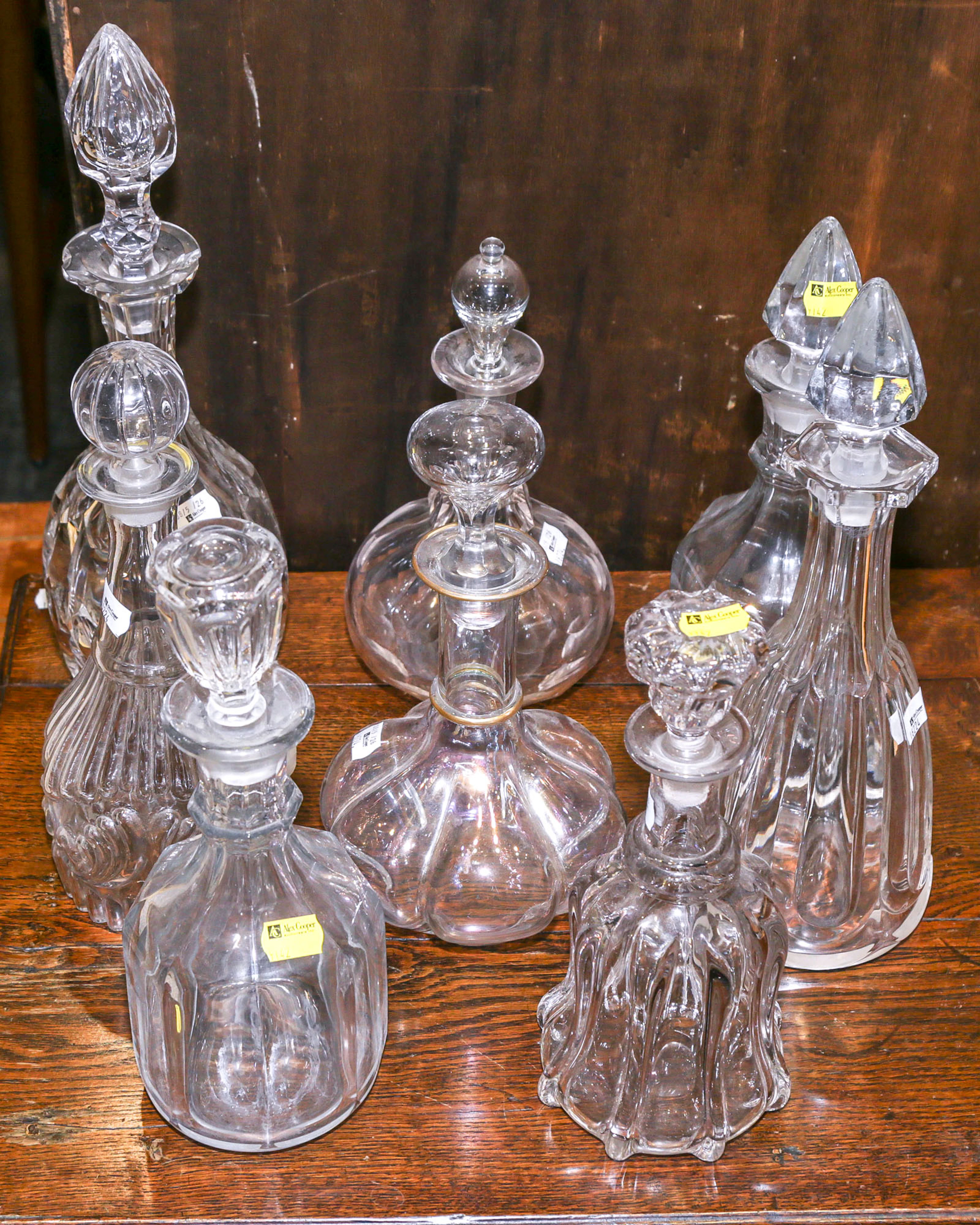 Eight Colorless Glass Decanters & Stoppers